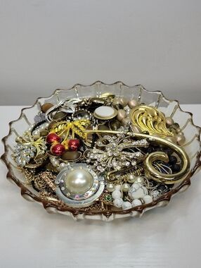 Mixed Jewelry In A Glass Dish